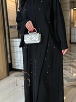 عباية فيروز بقماش كريب رموش مزين بشك ناعم