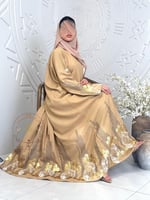 عباية صبا بقماش لنن بارد تطريز ترتر رملي