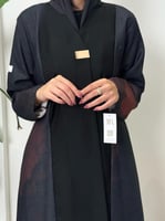 عباية ميرا ا بقماش لنن مطبع برتقالي بزرار فونكا