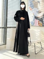 تشكيلة شتاء 2024 - عباية انسجام بقماش شامواه مع تط...