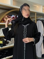 عباية نجلا بقماش كريب الاناقه بحياكة يدويه مزينه ب...