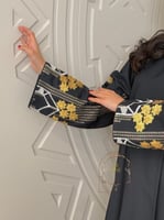 عباية صبا بقماش لنن بارد تطريز ترتر كحلي