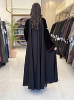 عباية ناري بقماش كريب الاناقة تدخيلات مخمل بتطريز...