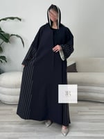 عباية تغريد l بقماش الاناقه تدخيلات كريب مقلم وبيج...