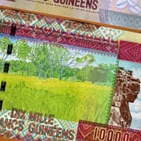 غينيا فئة 10000 فرنك أنسر