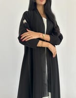 كريب فاحم اسود مطرز بالطول كلوش