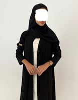 كريب أسود فاحم كلوش بتطريز يدوي ناعم