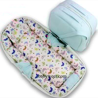 شنطة مع مفرش متنقل قطني لحديثي الولادة