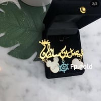 بروش مطلي ذهب مع تاج يمكن تغيير الفصوص مرفق صوره ل...