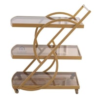 عربية ذهبي ثلاثة دور ديكور سطح زجاج بني