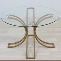 طاولة خدمة أو جانبية مع سطح زجاجي دائري