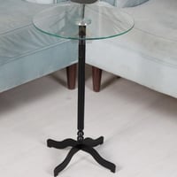 طاولة خدمة مفردة قاعدة أسود وسطح زجاج شفاف