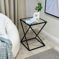 طاولة جانبية لون اسود سطح زجاج شفاف