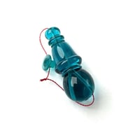 تركوازي شفاف - ورشة حسن سكر