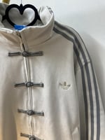 جاكيت اديداس نسخة السنه الصينيه