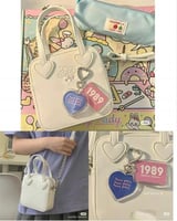 حقيبة مع ميدالية