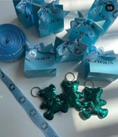 10ميداليات موسكينو مع الاكياس (ازرق )