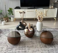 طاولة ضيافة بيضاوي شكل كور مع سطح زجاج شفاف