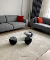 طاولة ضيافة بيضاوي شكل كور مع سطح زجاج شفاف