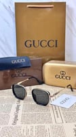 نظاره Gucci ذهبي