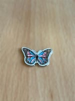 ملصق فراشه ملون