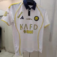 تيشيرت نادي النصر الابيض الجديد 2025-2026