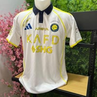 تيشيرت نادي النصر الابيض الجديد 2025-2026