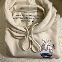 بلوفر القلب مع عباره داخليه