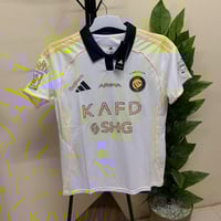 تيشيرت نادي النصر الابيض الجديد 2025-2026