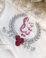 طقم مواليد بالاسم بناتي