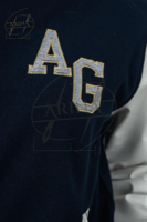 جاكيت سينيور - لون كحلي بأكمام جلد أبيض