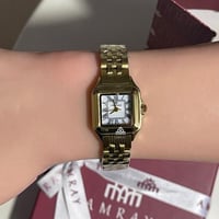 ساعه نسائيه ذهبي بأرقام لاتينيه