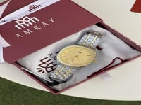 ساعه رجاليه فضي-ذهبي