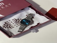 ساعه نسائيه تركوازي