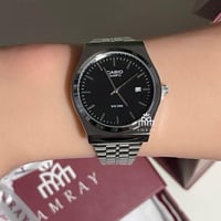 ساعه فضي بأسود