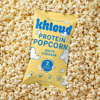 Khloud white cheddar protein popcorn