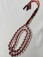 سُبحة بكلايت أحمر شفاف كركوشة.