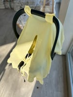 غطاء مبطن لمقعد سيارة مواليد موسلين - اصفر - صنع ف...