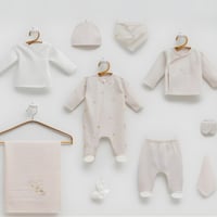 طقم مواليد استقبال 10 قطع بنقشة - و بربتوز بينك لح...