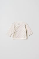 طقم استقبال مواليد بناتي 4 قطع - بلوزة "لف" مضلعة...