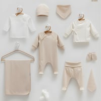 طقم استقبال مواليد 10 قطع بيج سادة ببنطلون و بربتو...
