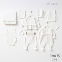 طقم مواليد بناتي 10 قطع - لون كريمي بنقشة زهور بار...