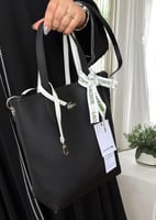 شنطة لاكوست بوجهين Lacoste