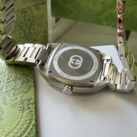 ساعه قوتشي + ملحقات ماستر