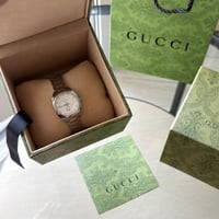 ساعه قوتشي + ملحقات ماستر