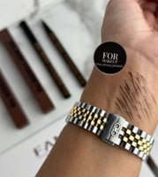 قلم حواجب + لاينر بني ضد الماء او لوف مي