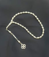 سبحه من الكروم مطلي فضه ٣٣ حبه