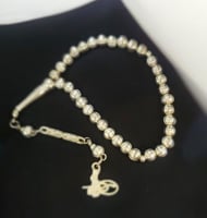 سبحه من الكروم مطلي فضه ٣٣ حبه