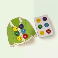 لعبة منتسوري لضم ازرار وخيطان