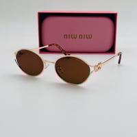 نظارة Miu Miu النسائية الفاخره